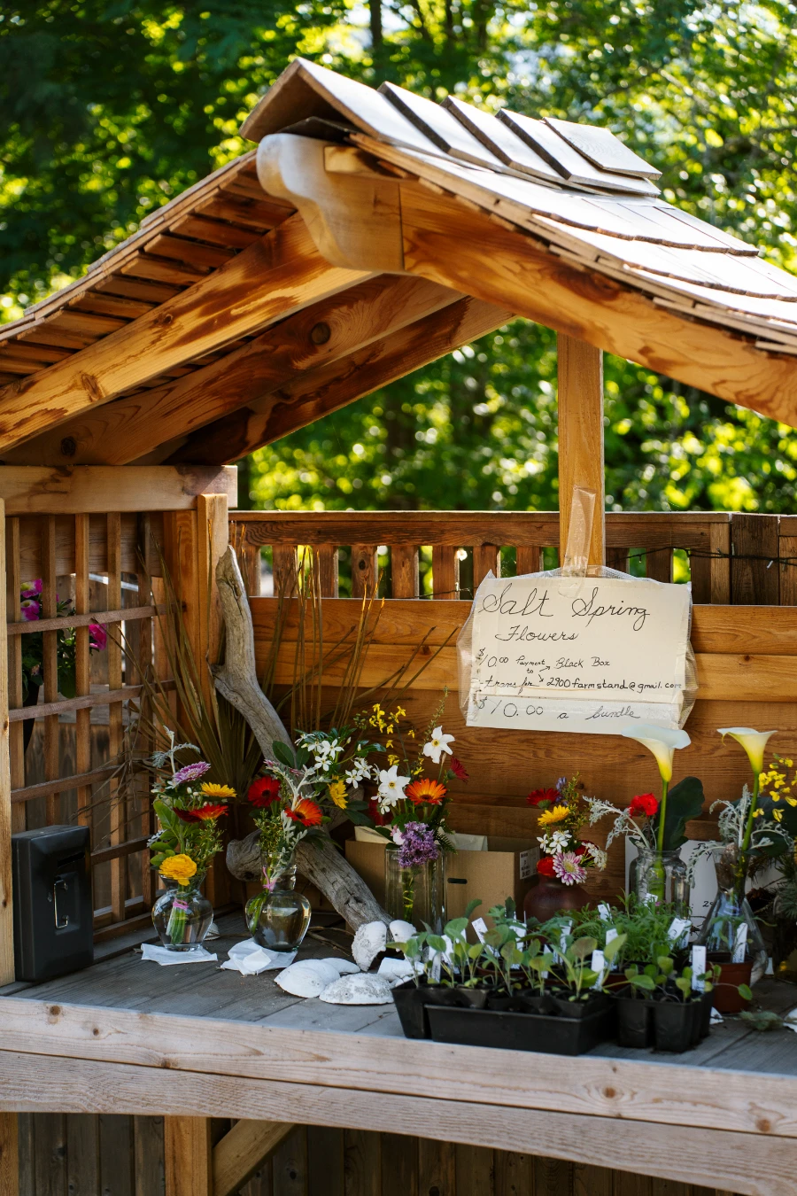 A farm stand selling fresh flowers on an honesty system