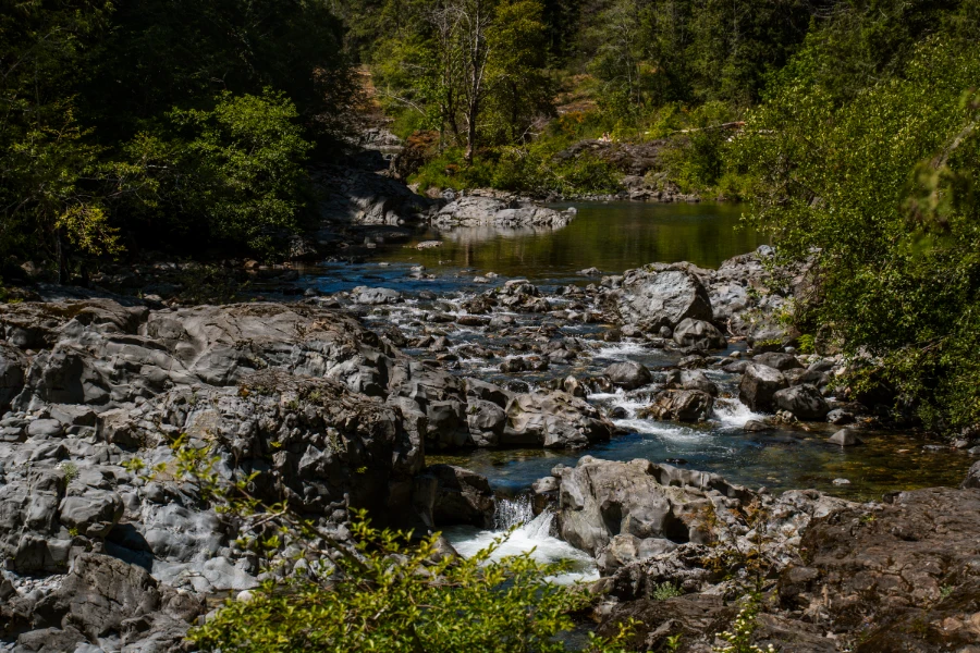 A river flows through a deep rocky canyon Sooke Potholes Provincial Park