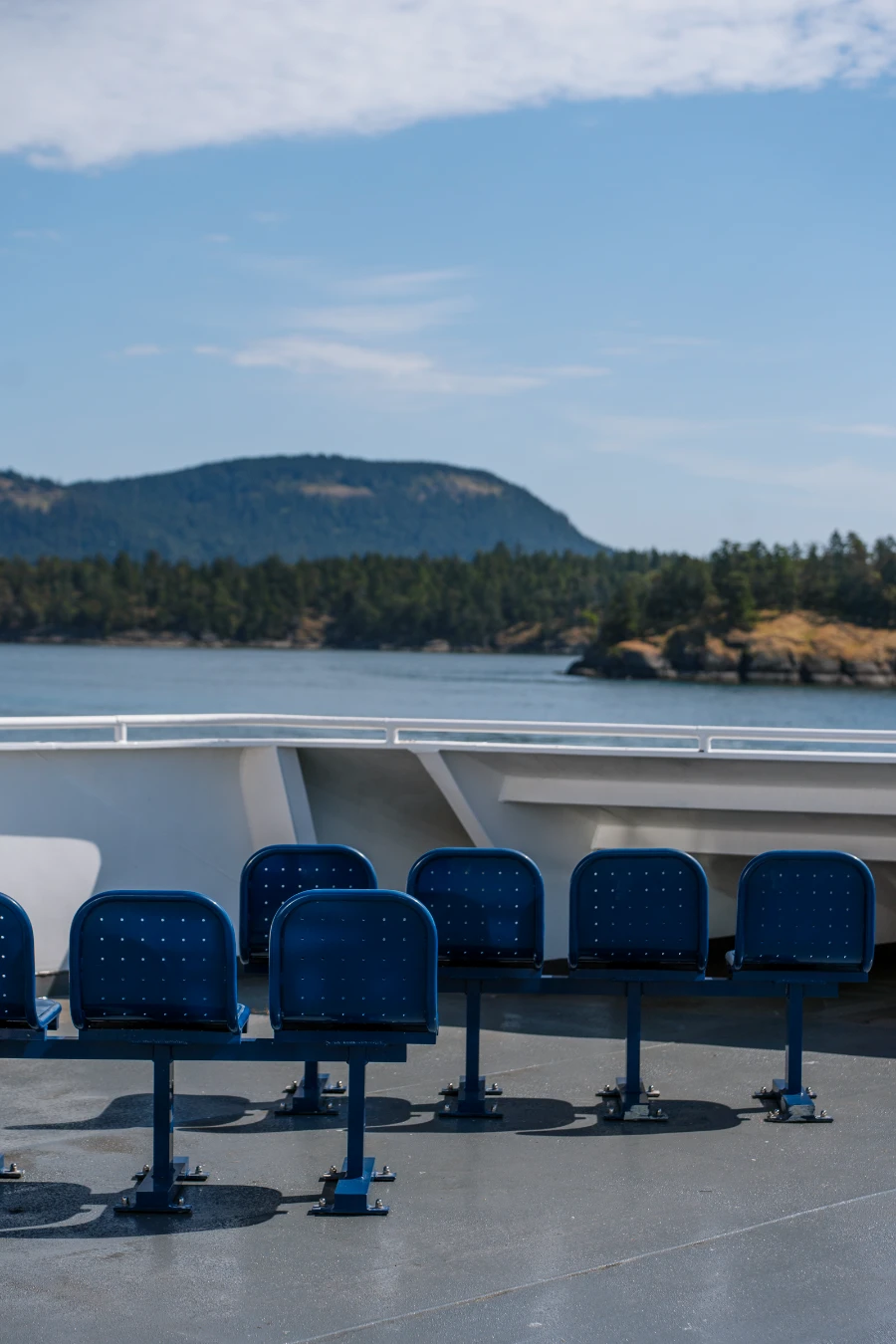 Rows of plastic chairs on the deck of a BC ferry