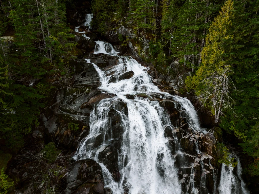 Several streams cascade down several layers of pools