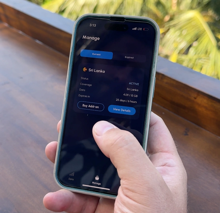 A hand holds an iPhone, and onscreen the details of an eSIM plan for Sri Lanka show the remaining data and time left on the plan