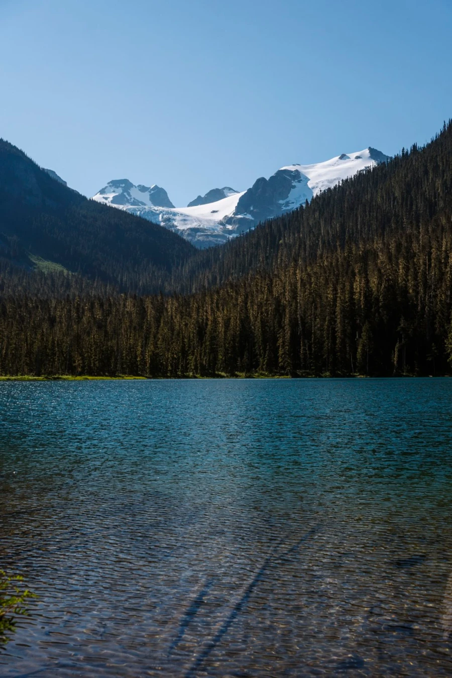 Lower Joffre lake with a mountain glacier behind it