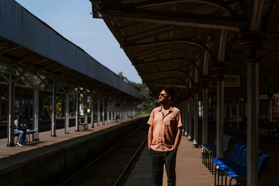 Kandy to Ella Train: Man stands in a train station