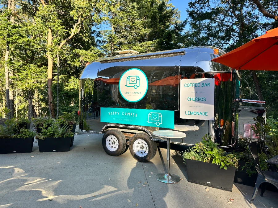 A silver metal food truck parked at the Malahat Skywalk