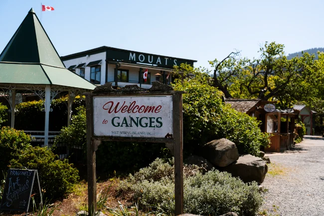 A sign reads Welcome to Ganges in front of the small town's centre