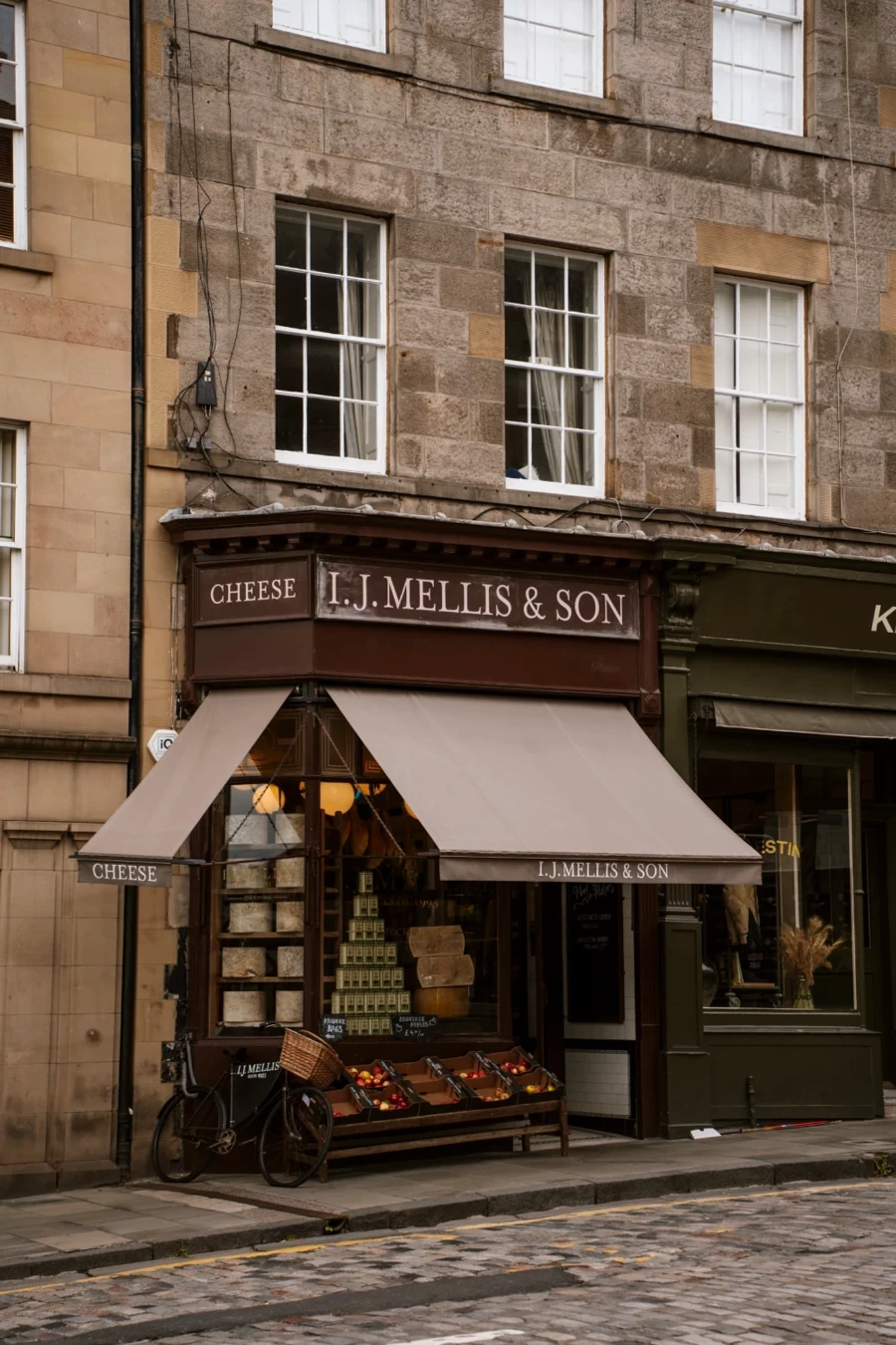 A cute general store with a bike parked next to their window display in Stockbridge
