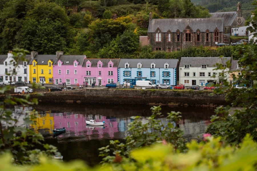 A row of colourful sea-side cottages in Portree on The Isle of Skye, Scotland