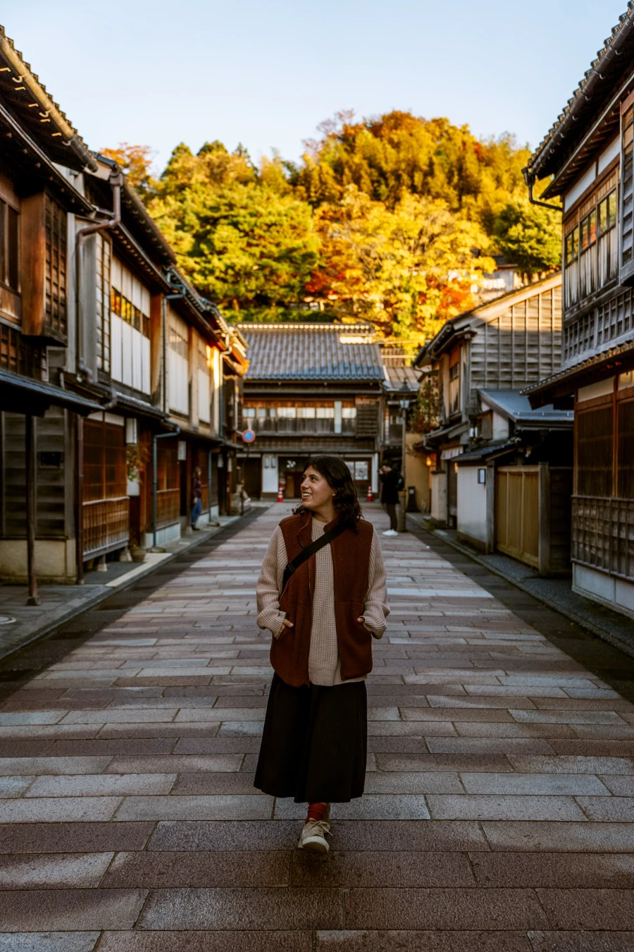 Woman walking down the emptyy streets of  Higashi Chaya District