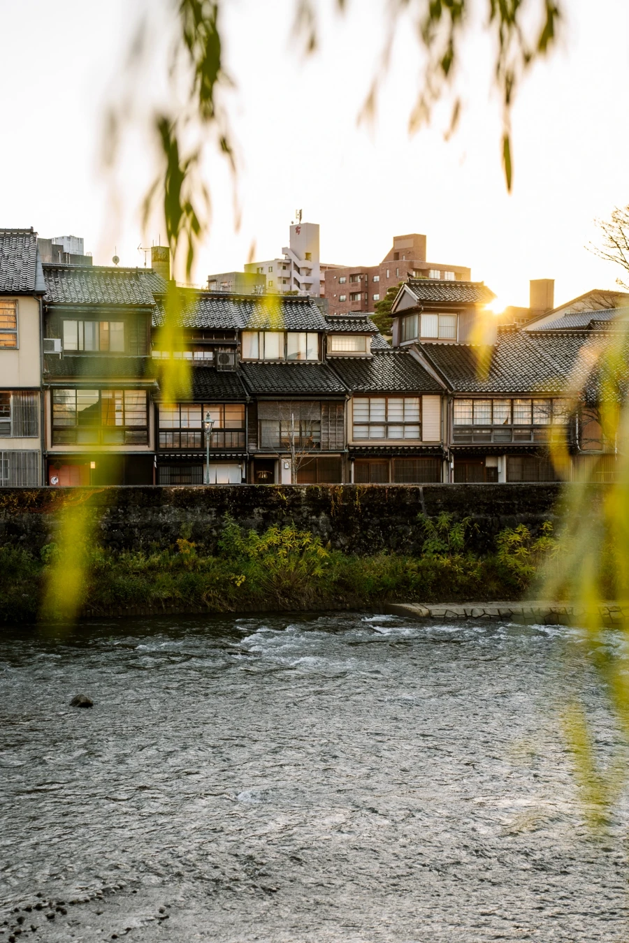 River flows past traditional houses in Kazuemachi Chaya District