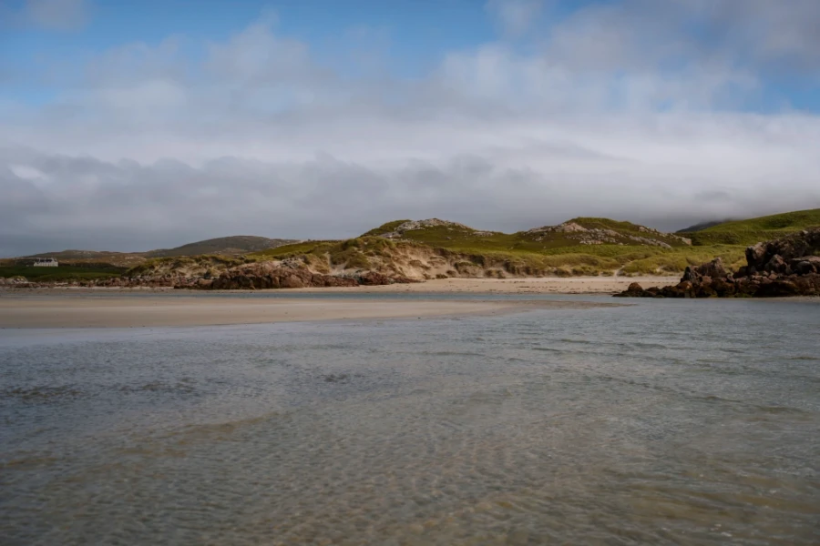 Shallow calm waters of Uig Sands beach