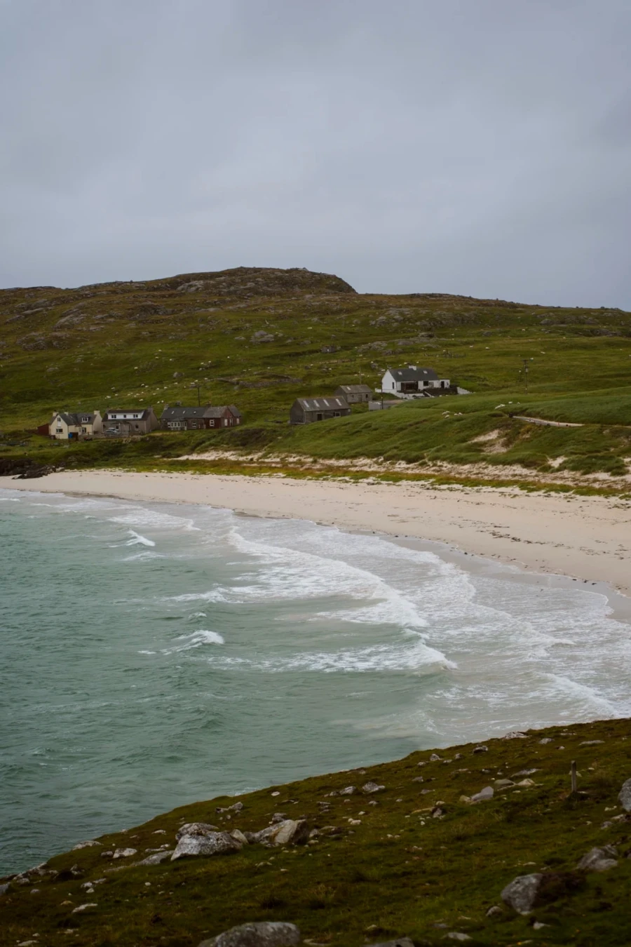 Gentle waves roll onto the sandy shores of Huisinis Beach