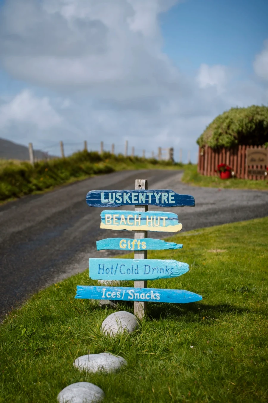 A make-shift sign directs visitors to an honesty system snack shack near Luskentyre Beach