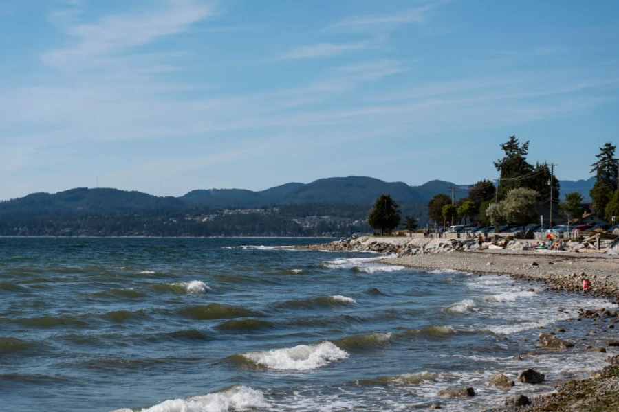 Waves meeting a rocky shore at Davis Bay in Sechelt, BC
