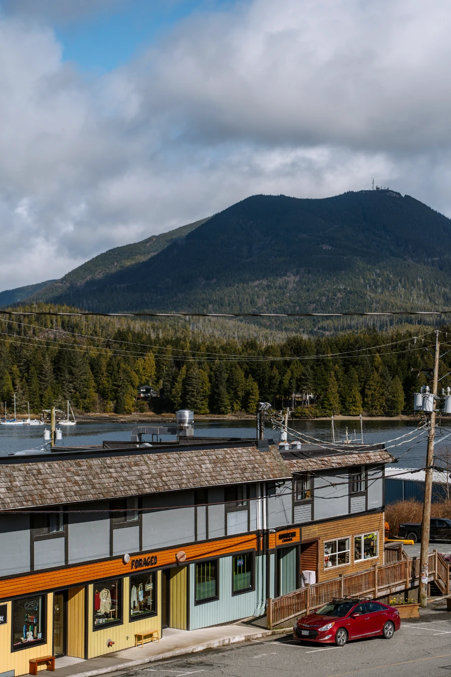 Storefront with apartments lining a road in Ucluelet on Vancouver Island