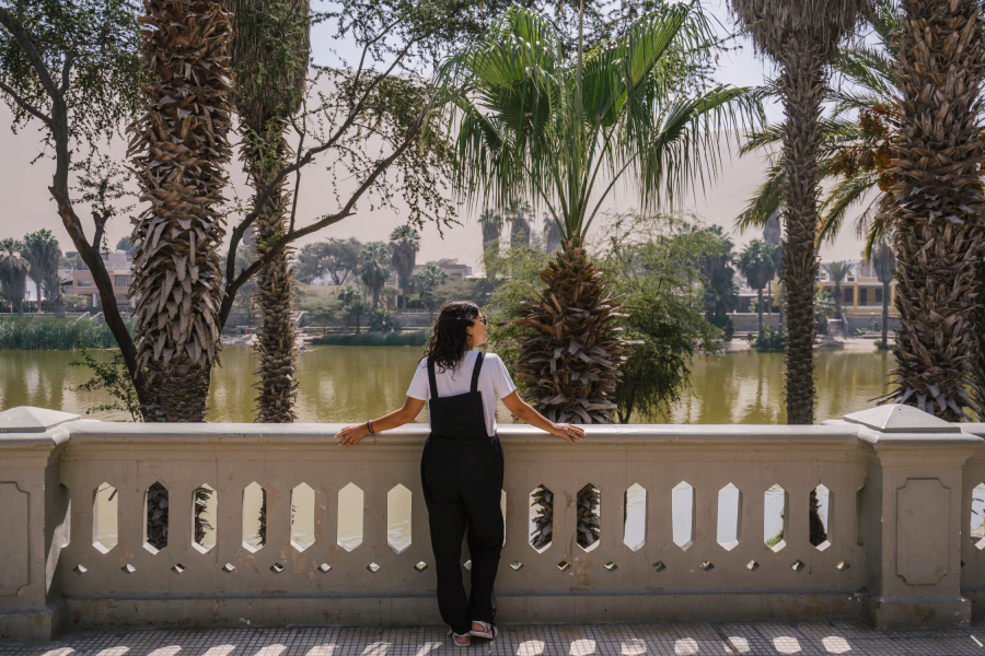 Best Things to Do In Huacachina, Peru: woman looks out on the lagoon