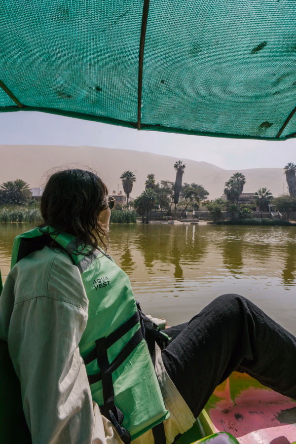 Best Things to Do In Huacachina, Peru: paddle boat on the lagoon
