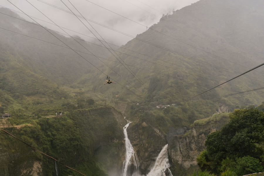 zipline over dramatic waterfall